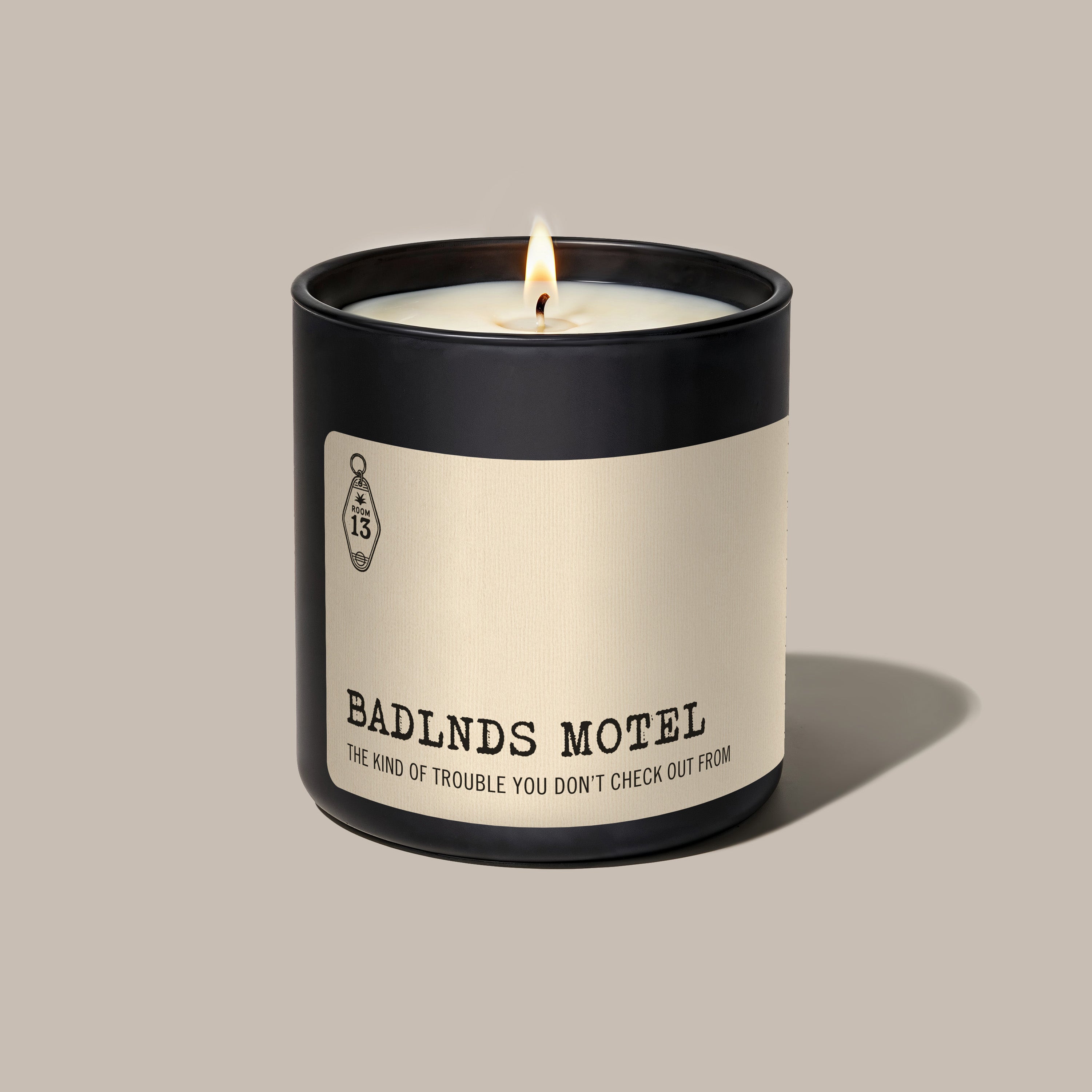 L　NEVER AFTER DARK NAD Candle ロンT　キャンドル BADLNDS MOTEL - LNDN GRAY